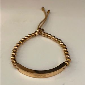 Stretchy rose gold Michael Kors bracelet